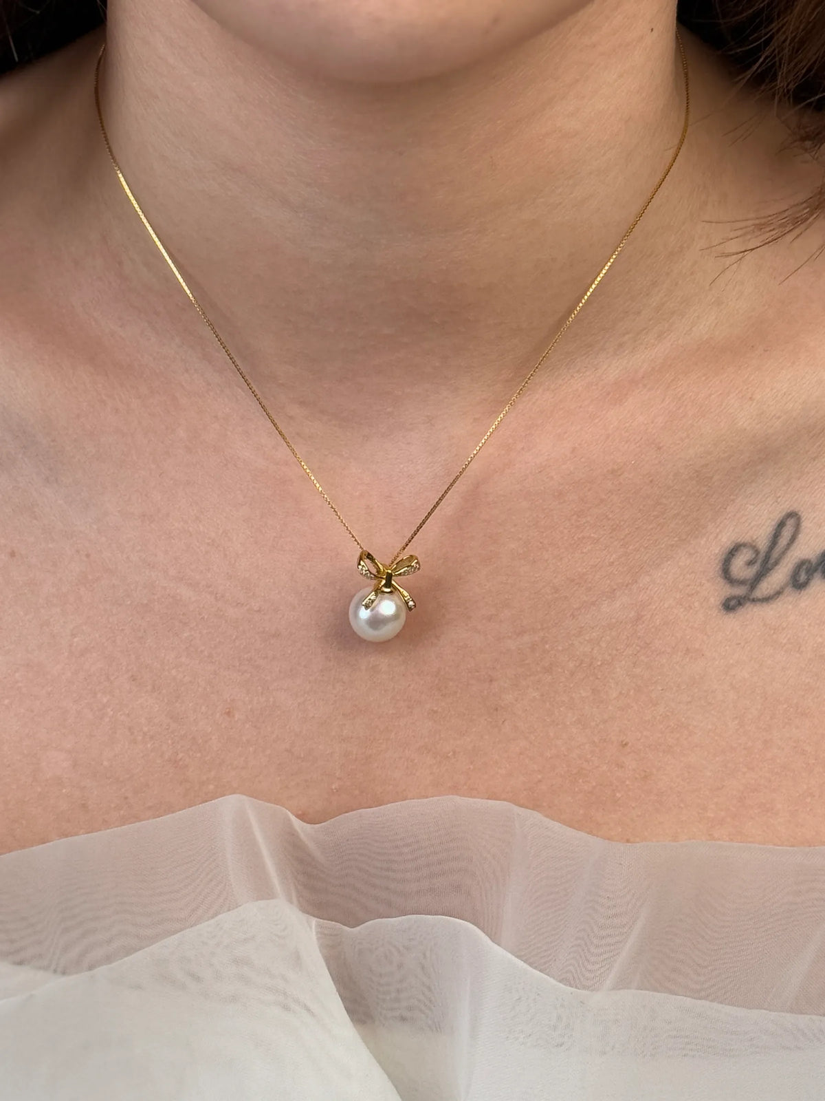 蝴蝶结吊坠 | Pearl Pendant